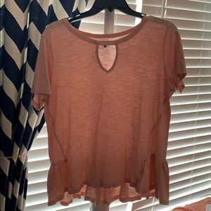 pink top that flares at the bottom